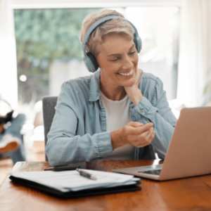 Woman teaching on a live video using her laptop